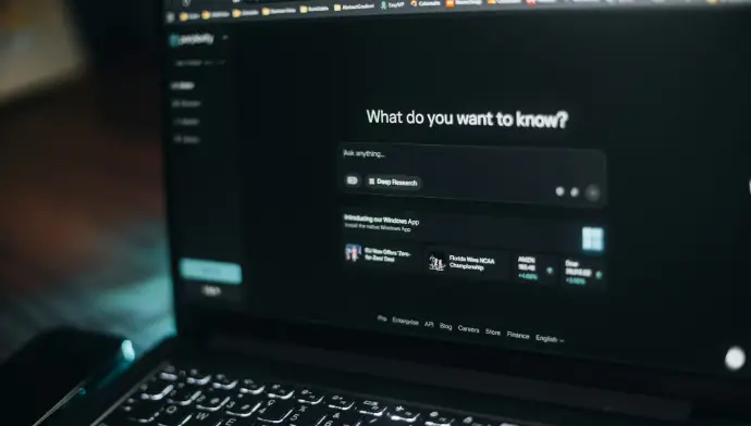 Laptop screen showing a search bar.